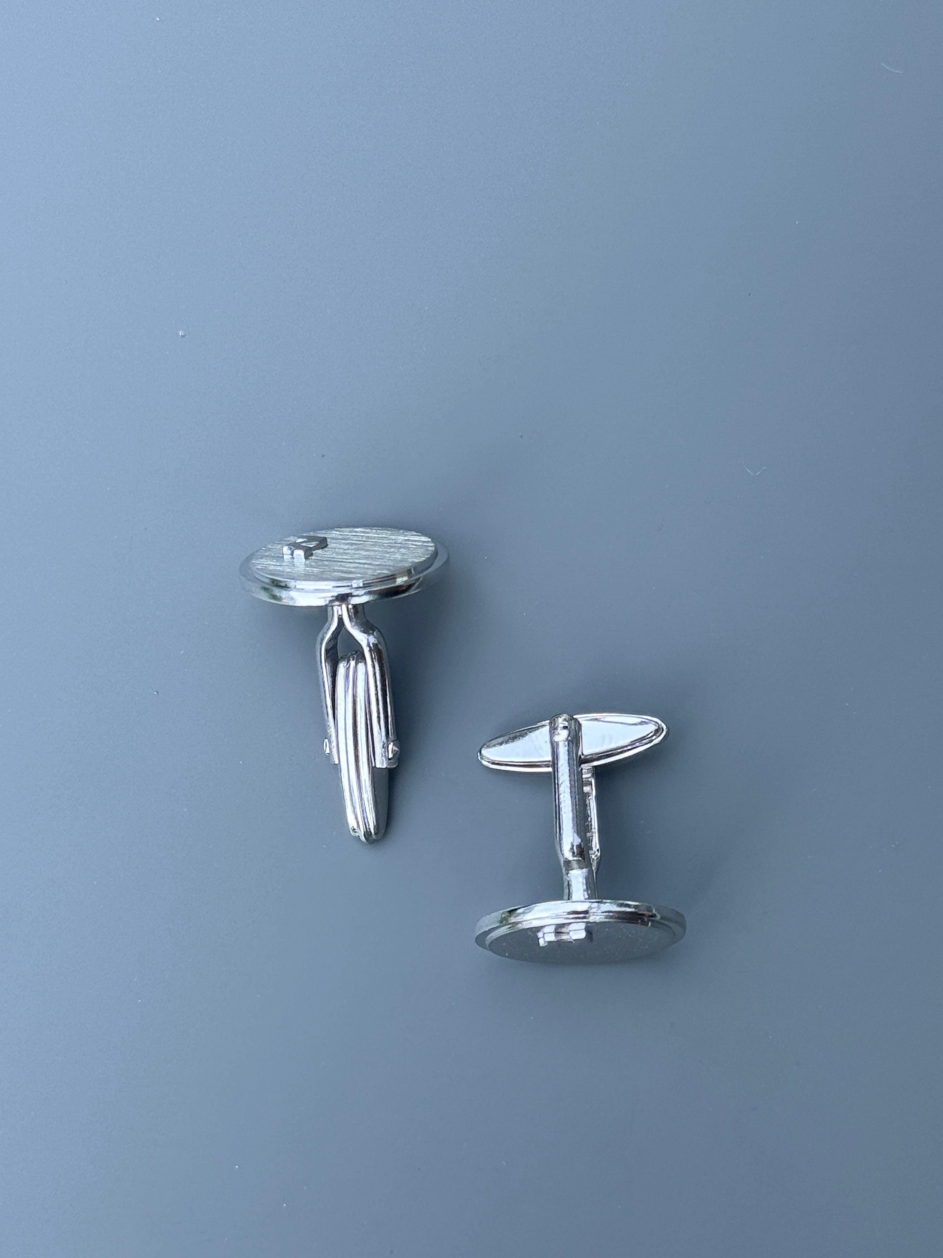 Nina Ricci Paris Silver Round Cufflink - Stylish Men's Accessory